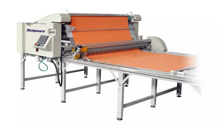 必一体育全自动针梭两用铺布机